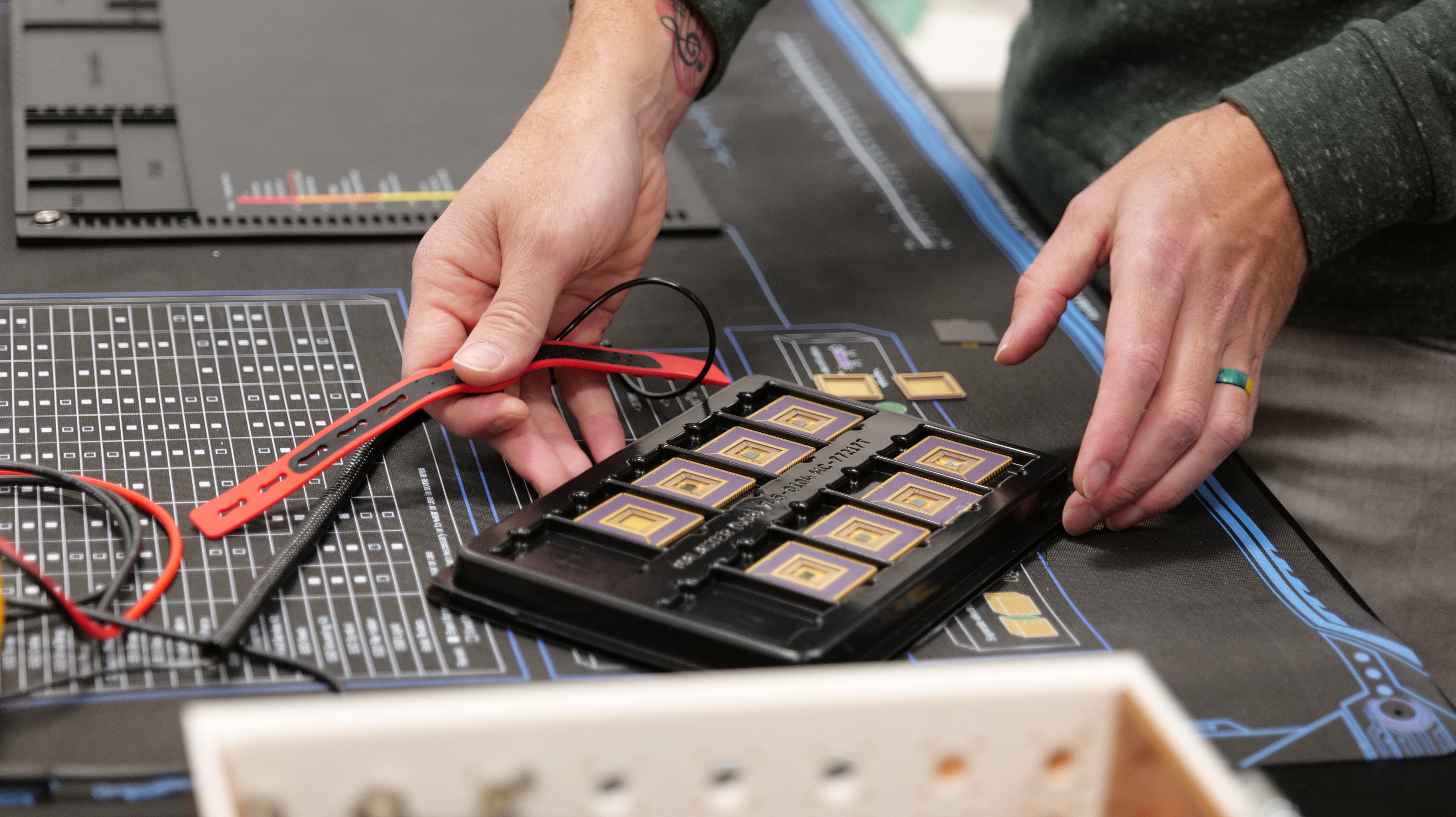 Person working with custom designed RadFX Chips